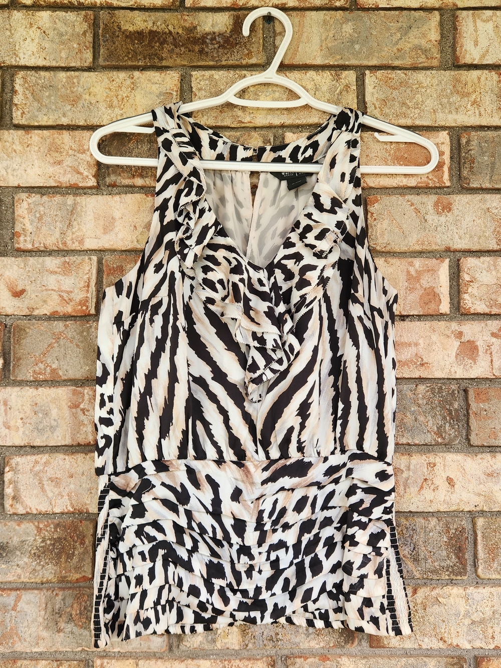 White House Black Market Black and White Ruffled Sleeveless Blouse